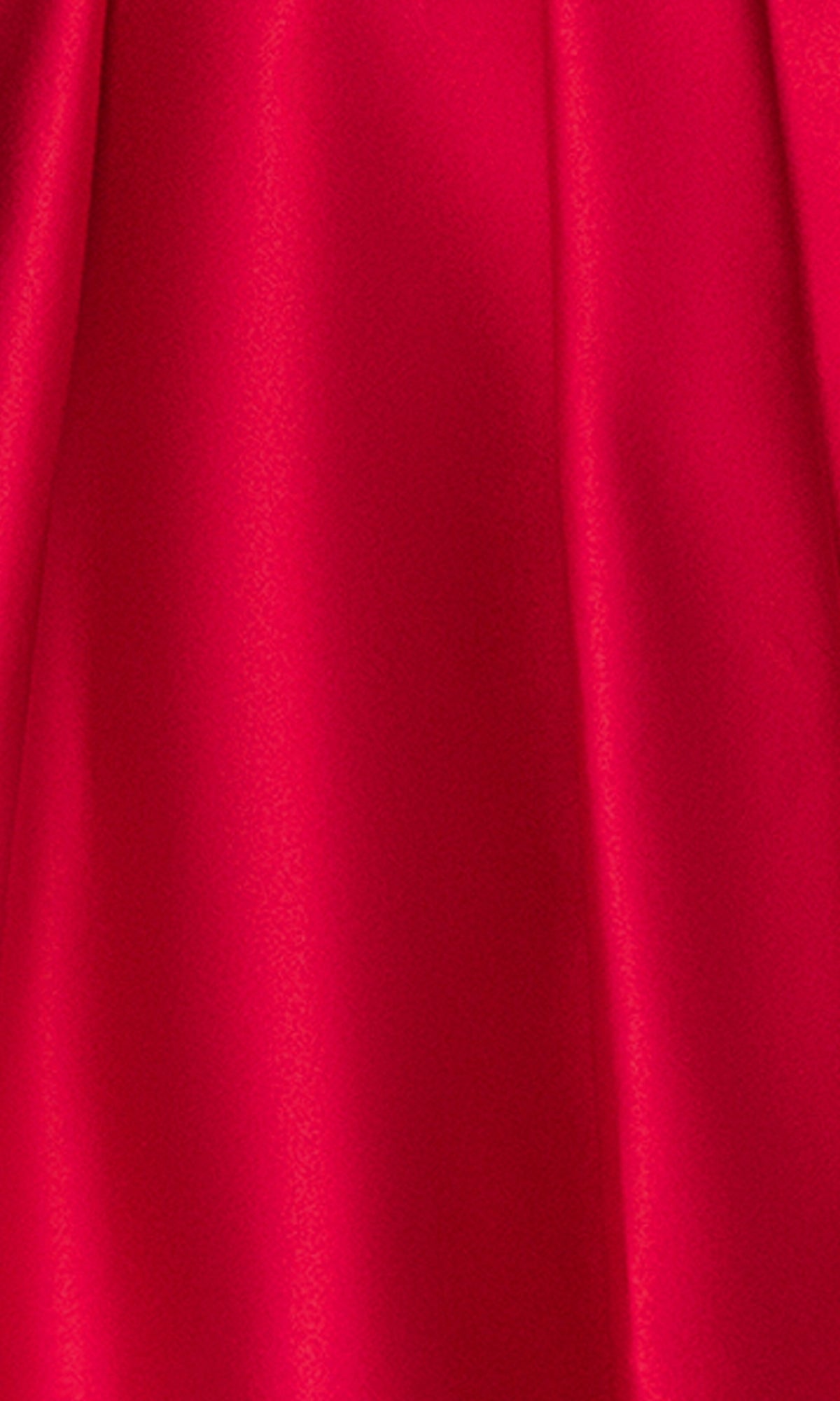 Close-up of a smooth, bright red satin fabric with subtle folds and a shiny finish, featured on the Off-Shoulder Red Hoco Dress: Blondie Nites 5695BN—ideal for statement-making style.